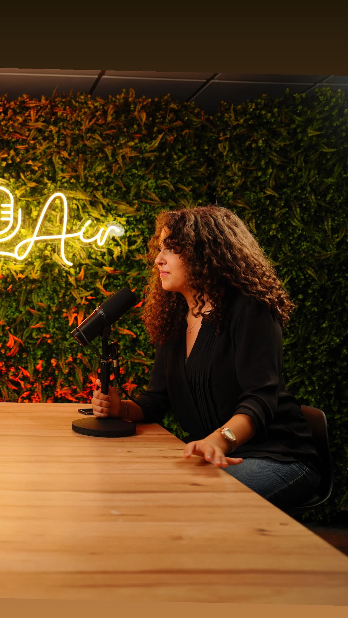 Hiba Belkhayat at the desk, mid-record